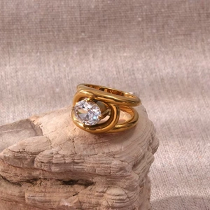 18K gold plated multi-layer stainless steel ring with oval zirconia on a natural stone