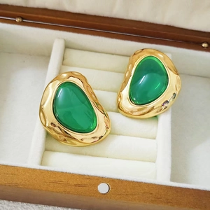 Retro stainless steel earrings with gold hammered texture and green resin inlay in box