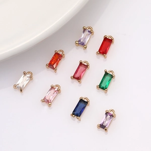 Macro shot of colorful rectangular crystal glass pendants for DIY jewelry making