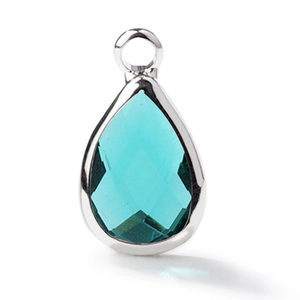 Detailed view of faceted blue glass teardrop pendant with silver metal bezel setting