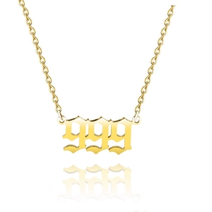 Detailed close-up of golden number 999 pendant with gothic font and delicate chain link