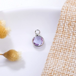 Detail of 6mm light purple multifaceted crystal pendant with silver bezel for DIY jewelry