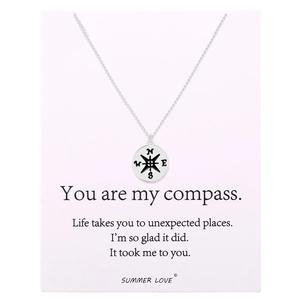 Silver compass pendant necklace on a gift card with the text You Are My Compass