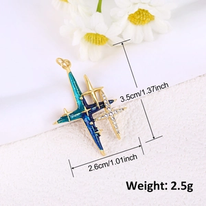 Detailed view of gold plated star pendant with blue enamel and dimensions 3.5x2.6cm