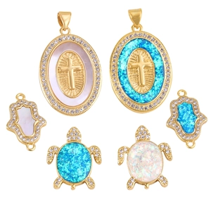Gold plated opal blue turtle and cross charms with zircon insets for jewelry making