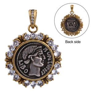 Detailed front and back views of a vintage coin pendant with goddess relief and pavé zircons