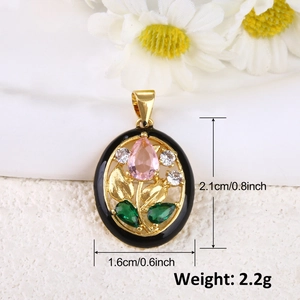 Detailed view of floral pendant with pink gems and gold frame including dimensions
