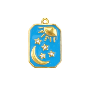 Detail of a rectangular gold-plated pendant with blue enamel, sun, moon and zircon stars