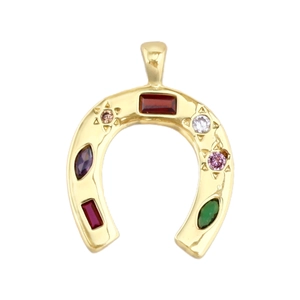 Detailed view of horseshoe pendant with colorful gemstones and star-shaped engraving