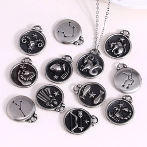 Pendentifs double face 12 signes du zodiaque en acier inoxydable avec finition argent antique