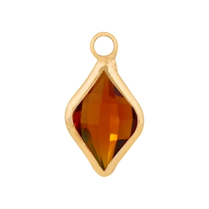 Macro shot of rhombus amber glass charm with gold-plated copper frame for DIY necklaces