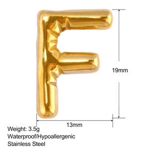 Polished gold stainless steel letter F bubble pendant showing dimensions 19mm x 13mm