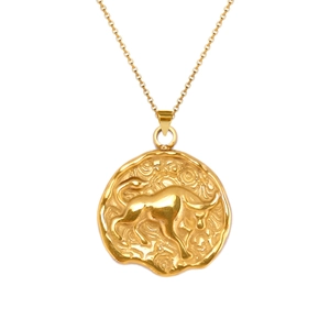 Detail of 18K gold-plated Taurus pendant featuring a relief bull and hammered texture