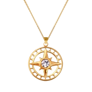 Detailed view of gold stainless steel necklace with a compass star pendant and zircon