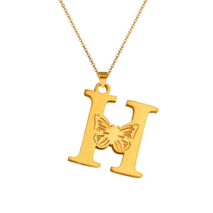 Detailed macro view of 18K gold letter H pendant with engraved butterfly on fine chain