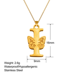 Detail view of 18K gold plated stainless steel letter I pendant with butterfly engraving