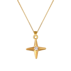 Macro detail of gold star pendant necklace featuring a central sparkling cubic zirconia
