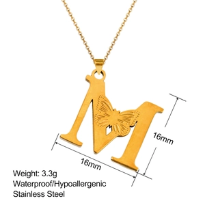 18K gold plated stainless steel letter M necklace with hollow butterfly pendant detail