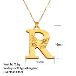 Detailed view of 18K gold plated stainless steel letter R pendant with butterfly texture