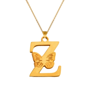 Macro view of 18K gold letter Z pendant with butterfly detail on a stainless steel chain