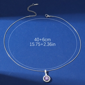Elegant stainless steel necklace with round purple zircon pendant on blue background