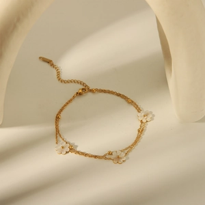 Tobillera de doble capa de acero inoxidable bañado en oro 18K con margaritas de nácar