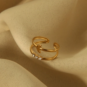 Detailed shot of double layer gold stainless steel ring with moon and rhinestones