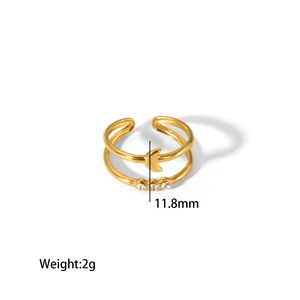 Detail of 18K gold-plated star and moon open ring with sparkling white zircons