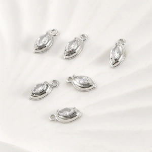 Close-up of silver marquise zircon charms with claw setting for DIY jewelry design