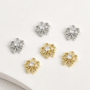 Set of 14k gold and silver plated bow pendants with sparkling cubic zirconia for DIY jewelry