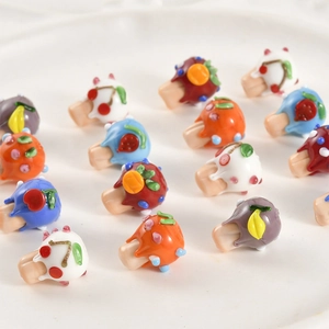 Handmade lampwork glass beads in miniature cake and fruit shapes for DIY jewelry making