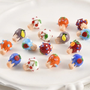 Handmade lampwork glass beads in colorful mushroom and fruit shapes for DIY jewelry making