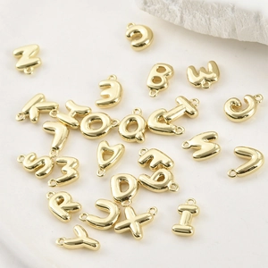 Ciondoli lettere alfabeto 3D placcati in oro con anellini per gioielli fai da te