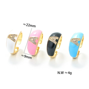 Detailed size view of enamel initial A rings in white, pink, black, and blue finishes