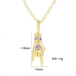 Detail of a 18x6mm gold hand gesture pendant featuring purple heart-shaped zircon stones