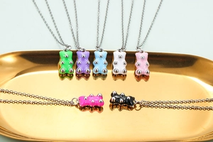 Detailed view of colorful 3D gummy bear charms and gold alloy chain necklace set