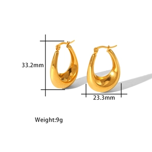 Detail shot showing 33.2mm height and 23.3mm width of gold-plated U-shaped drop earrings