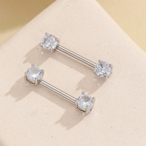 Pair of barbell nipple rings with round cubic zirconia in silver stainless steel