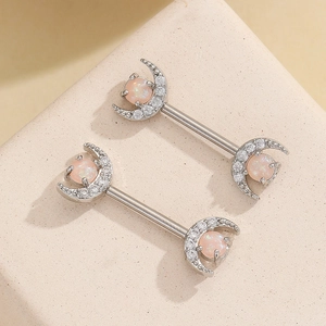 Pair of crescent moon nipple rings with pink opal and white cubic zirconia accents