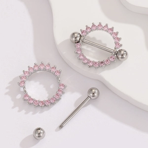 Detail view of pink zircon nipple ring with 18K gold plated stainless steel screw ball