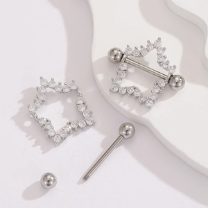 Detailed components of a silver steel star zircon nipple ring with screw balls and bar