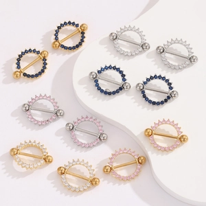 18K gold plated stainless steel nipple rings with colorful zircon inlays displayed on white