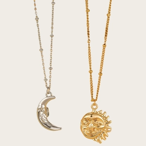 Celestial sun and moon magnetic necklaces in 18K gold and silver stainless steel finish