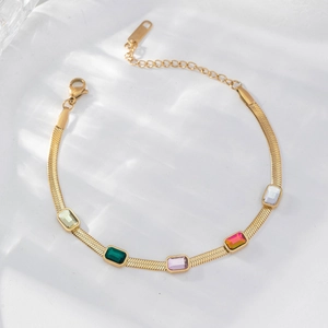 Flat gold snake chain bracelet with five rectangular colored zircons and lobster clasp