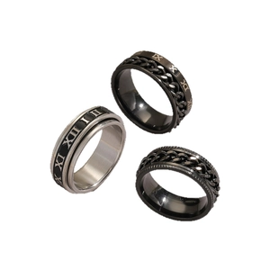 Three-piece stainless steel ring set with Roman numerals and rotating chain punk design