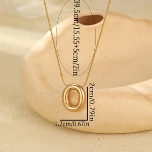 18K gold plated stainless steel necklace featuring a chunky letter O pendant with ridges
