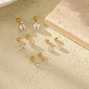 Macro view of four different sizes of 18K gold plated stainless steel zircon stud earrings