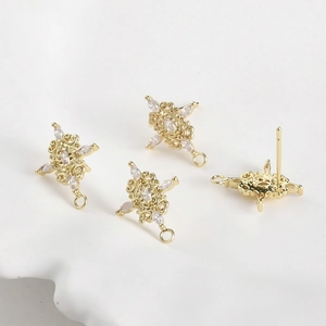 Dettaglio di orecchini a perno vintage placcati oro 14k con zircone marquise per gioielli DIY