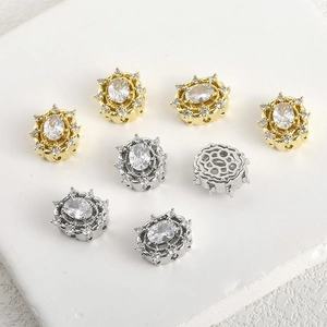 Detail view of oval cubic zirconia spacer beads with hollow back for DIY jewelry