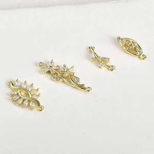 Connettori dorati 14k a forma di foglia e fiore con zirconi per gioielli fai-da-te